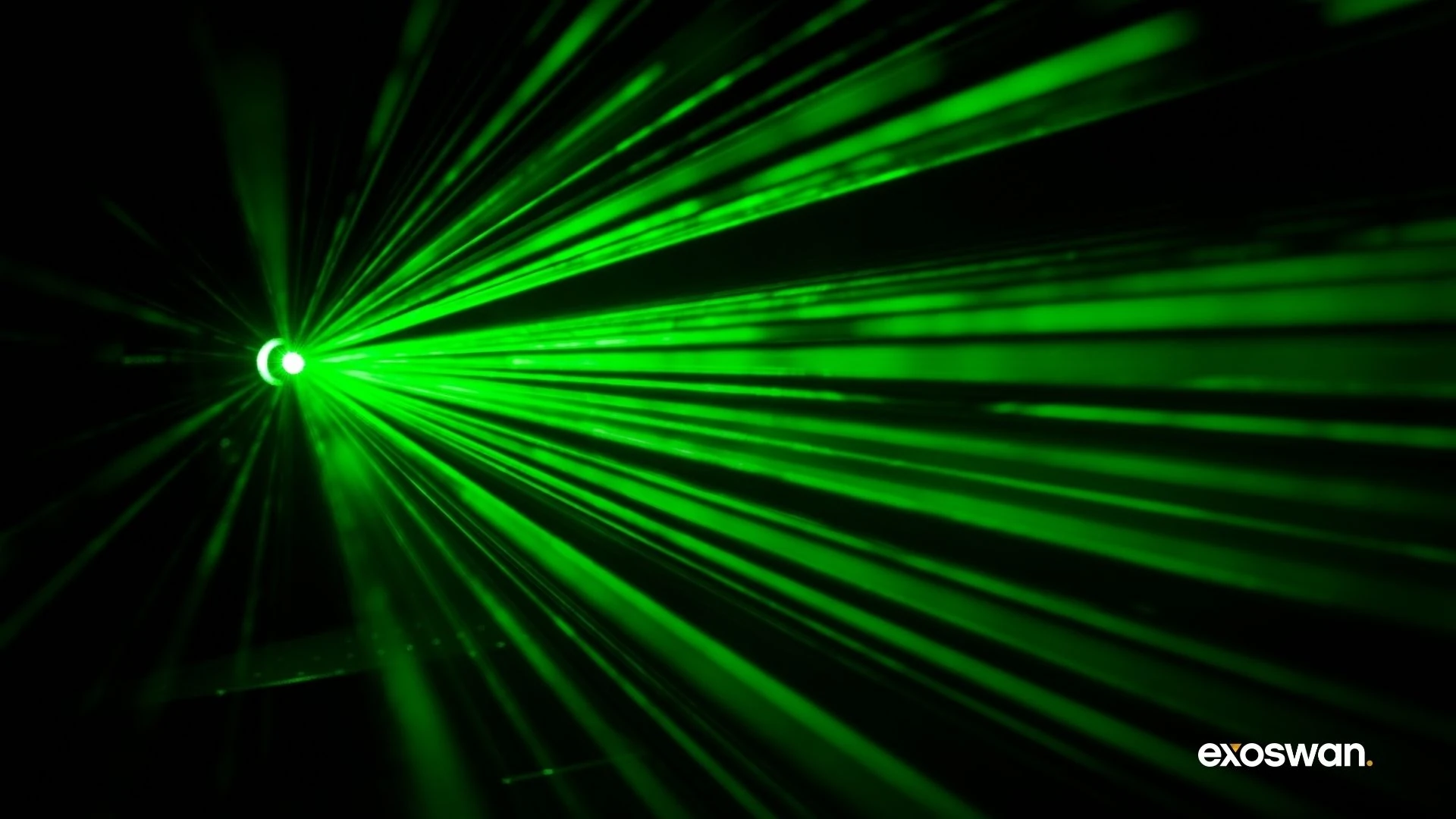 Green light rays spreading across a dark background.