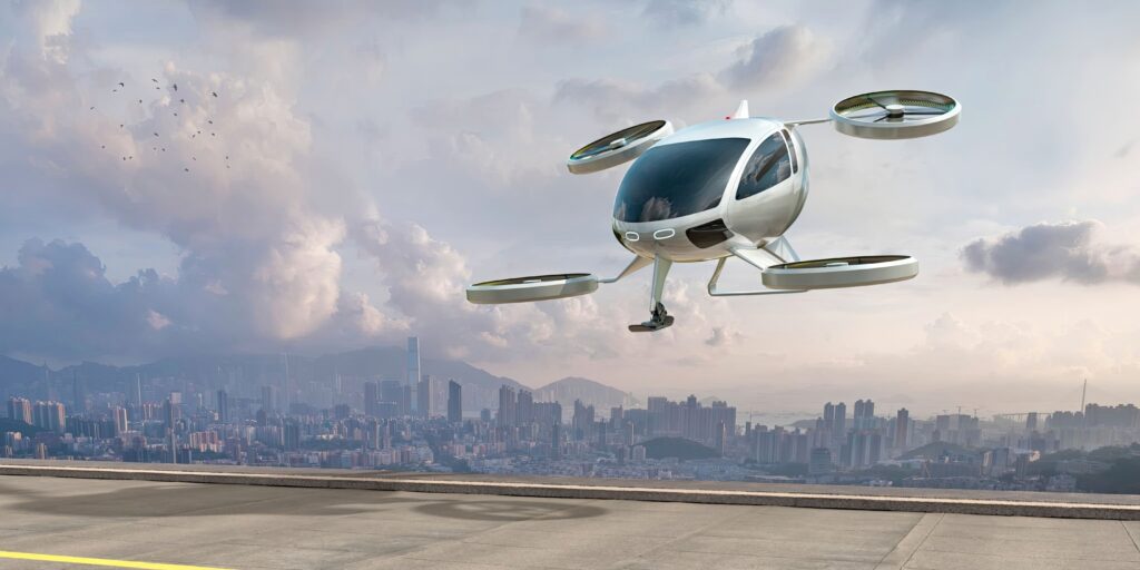 EVTOL Electric Vertical Take Off and Landing Aircraft About To Land Near City